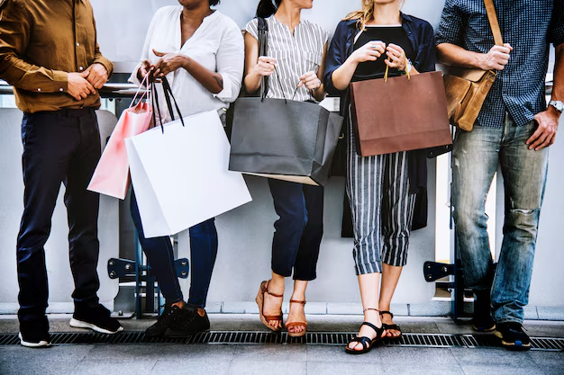 People shopping at a bonus redemption event using their loyalty program card